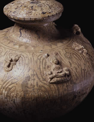 Covered Jar with Winged Figurines