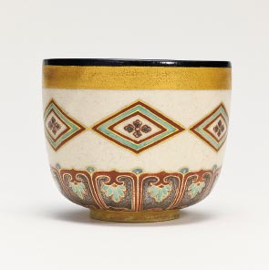 Tea Bowl with Linked Floral Lozenges
in Overglazed Enamels and Gold and Silver Paint