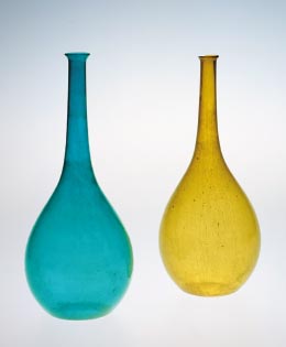 Bluish-green tall-necked glass bottle  
Yellow tall-necked glass bottle